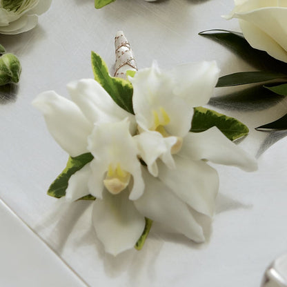 White Mini Cymbidium Boutonniere – HEART LAKE FLOWERS & GIFTS, Brampton ON